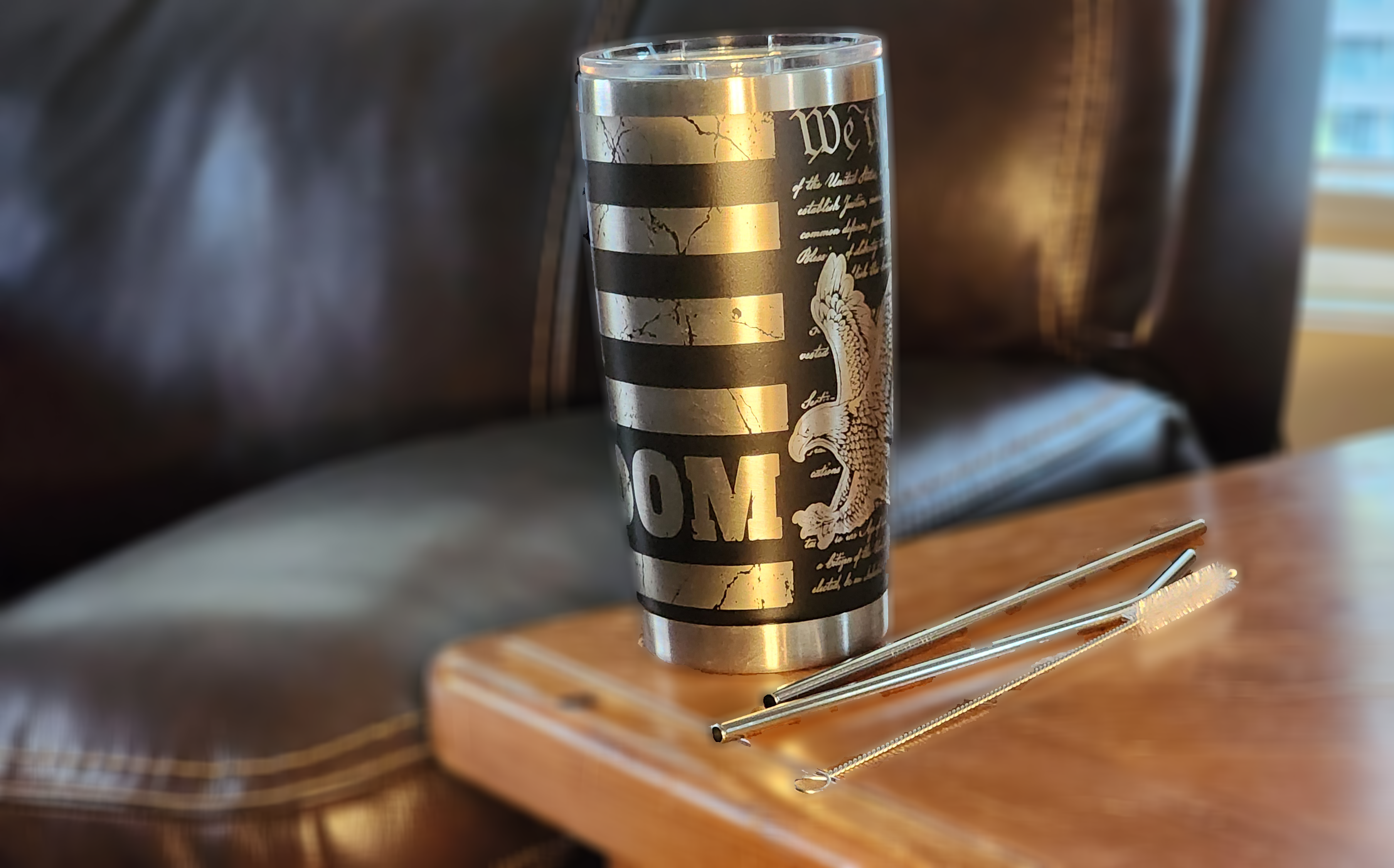 Custom engraved freedom 20oz tumbler with black and silver design featuring an eagle and American flag