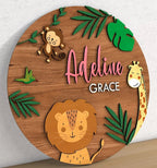 Studio photo of custom wooden nursery sign with animal theme.