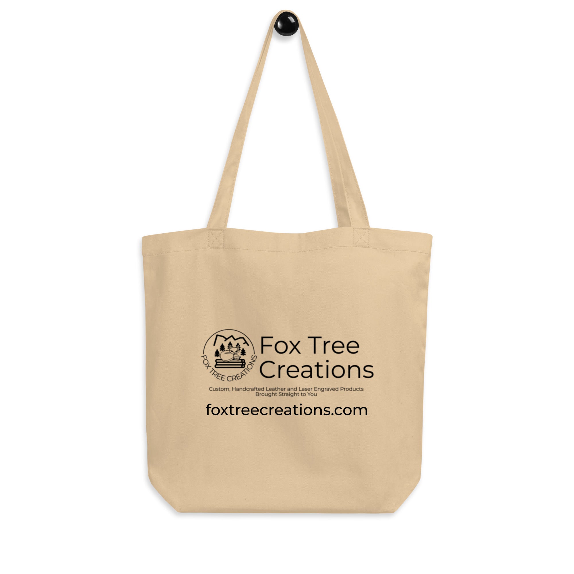 Beige eco-friendly tote bag for gifts from Fox Tree Creations with a logo and website