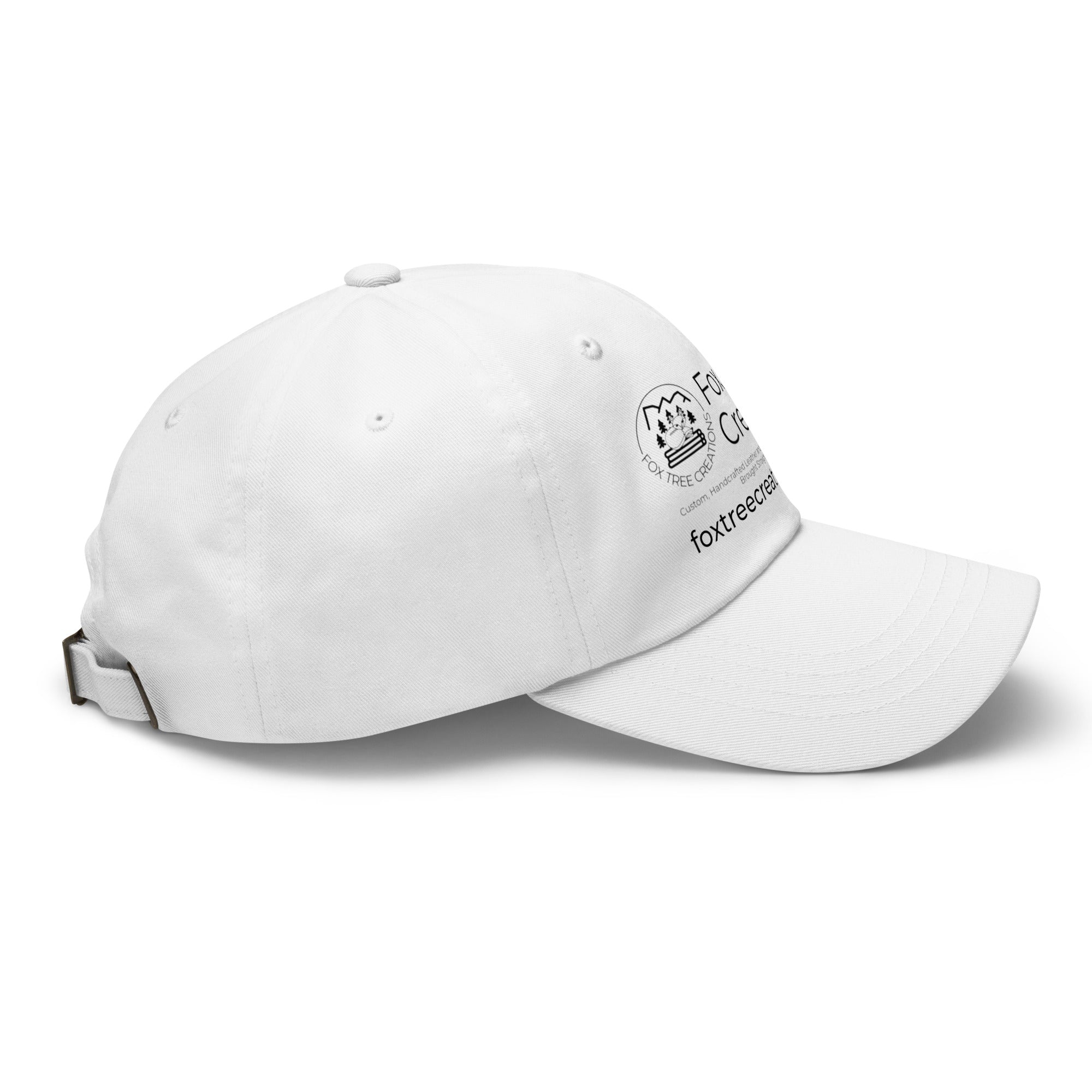 White Fox Tree Creations hat featuring an engraved logo for stylish outdoor wear