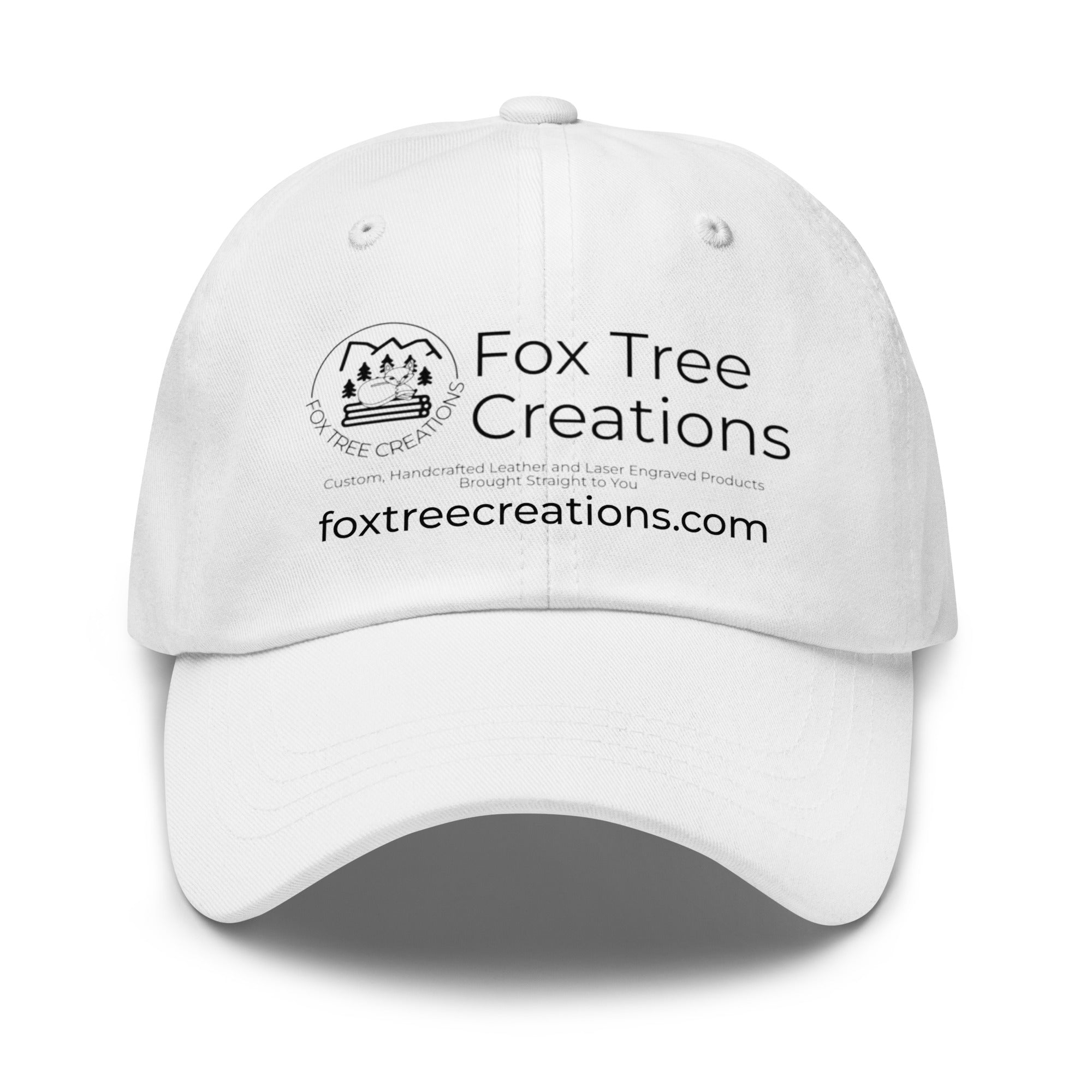 White adjustable cap featuring an engraved logo hat by Fox Tree Creations for stylish outdoor wear