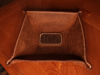 Fox Tree Creations full grain leather valet tray with stitched edges on wooden surface