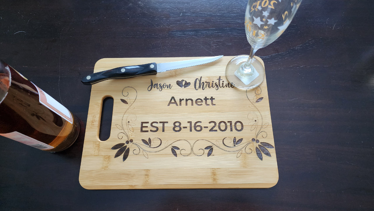 Personalized anniversary cutting board from Fox Tree Creations with custom names and date engraving