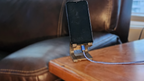 Fox Tree Creations personalized device stand for phones and tablets on a wooden table