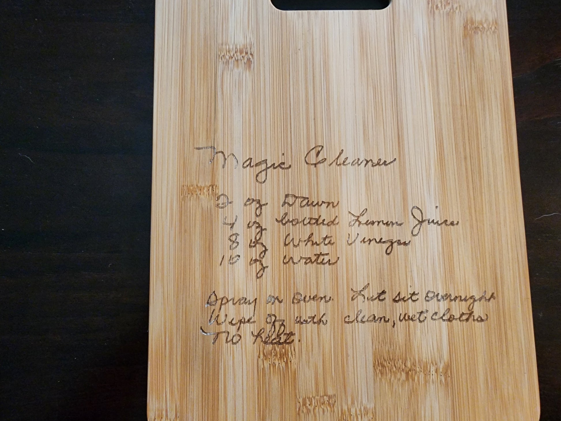 Personalized recipe cutting board featuring etched cleaning instructions for easy reference