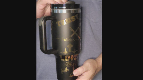 Video showing 40oz faith gift tumbler featuring inspirational words and cross designs for daily motivation