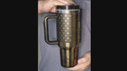 Video showing Custom engraved Freedom 40oz tumbler by Fox Tree Creations featuring a sleek black design for stylish hydration