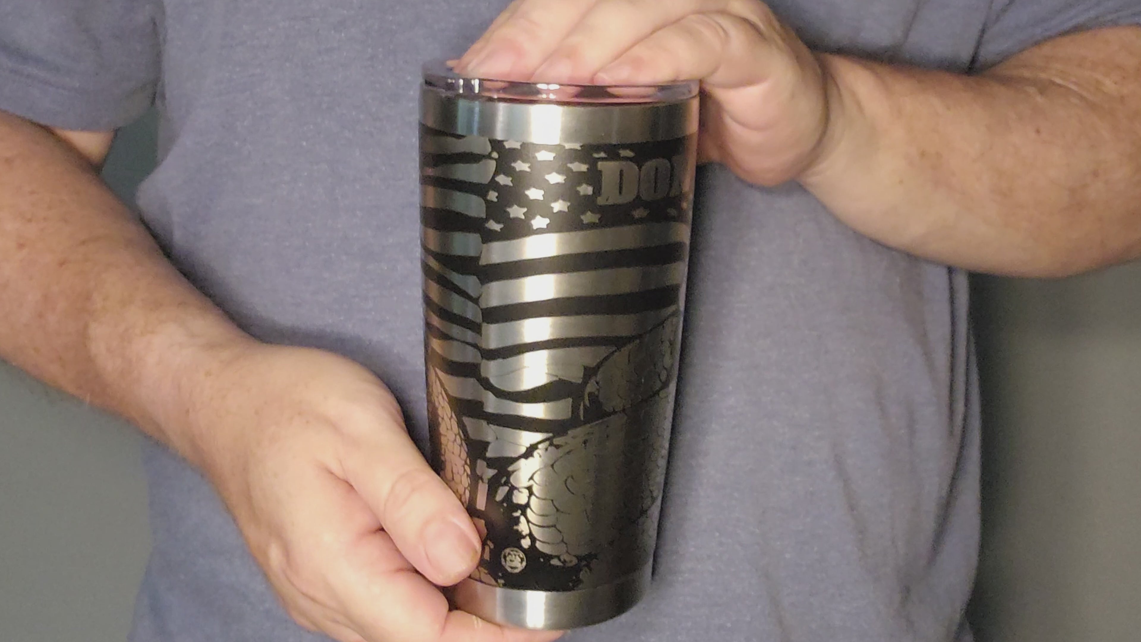 Video showing Unique Don't Tread 20oz tumbler featuring an engraved design with an American flag and snake