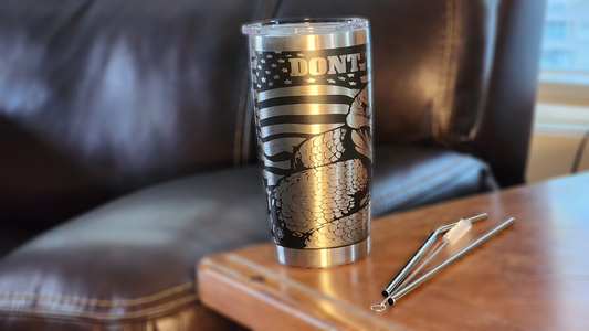 Unique Don't Tread 20oz tumbler featuring an engraved design with an American flag and snake