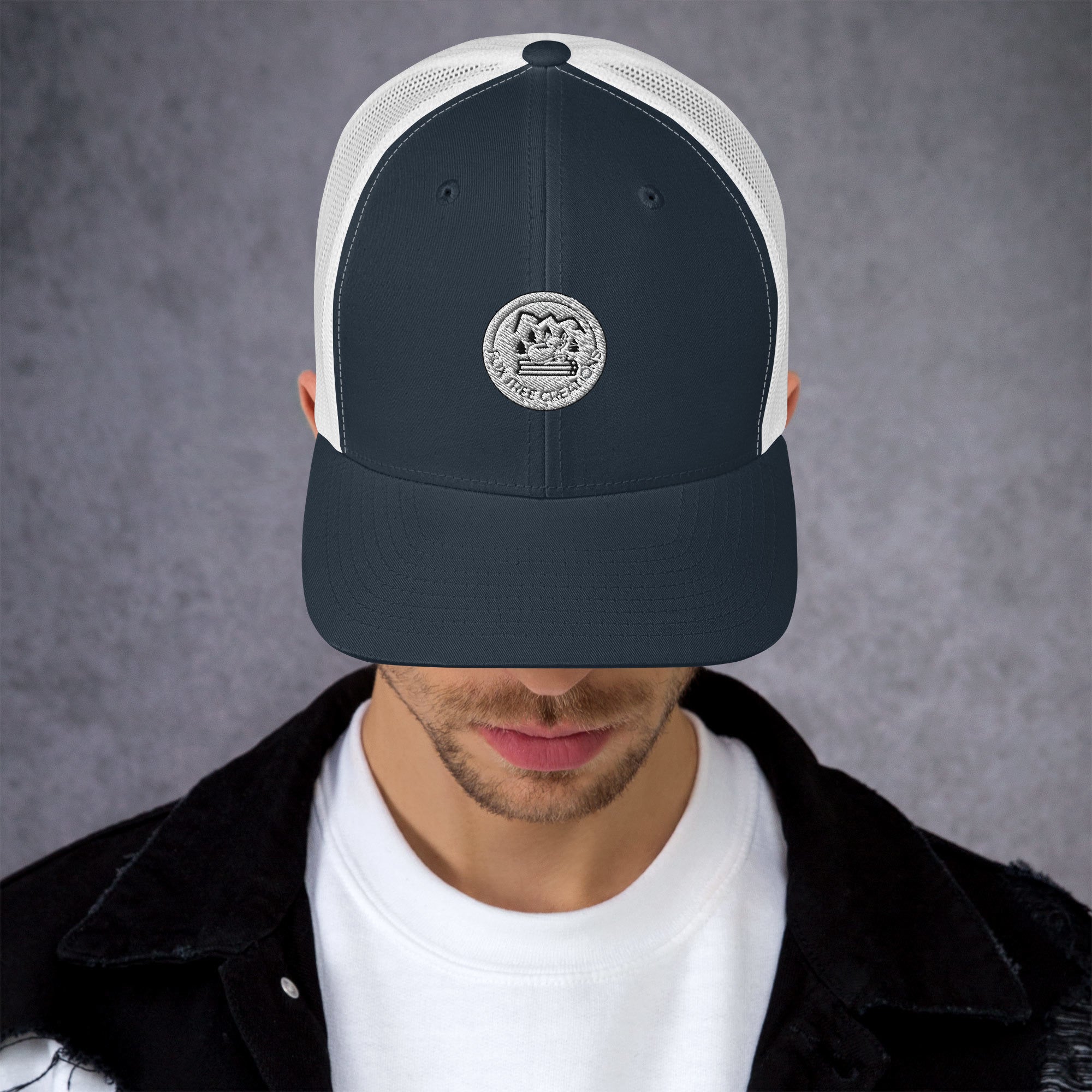 Navy Fox Tree Creations unique gift trucker cap with a stylish round logo on the front