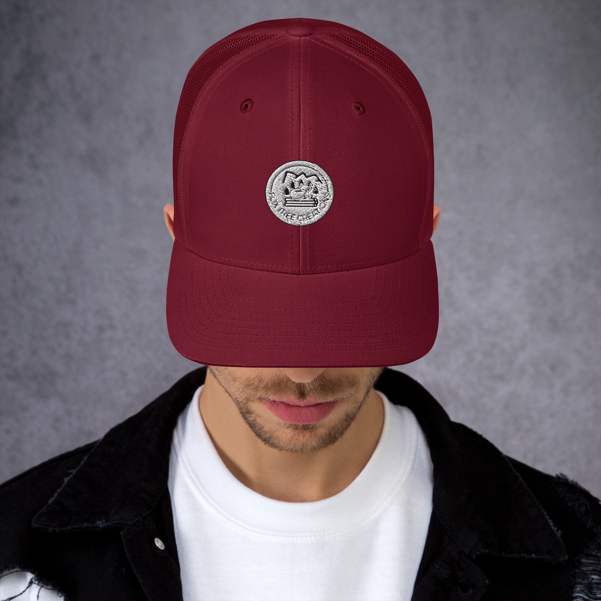 Burgundy unique gift trucker cap features a stylish logo for a trendy look