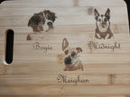 Unique picture cutting board featuring custom pet engravings of dogs with names Bogie, Midnight, and Meighan